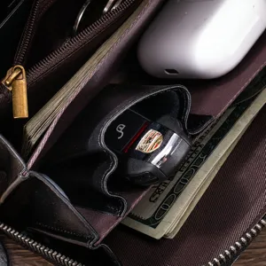 Detailed view of men's genuine leather long wallet interior showing spacious card slots and compartments.