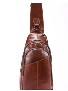 Close-up detail view of mens genuine leather chest bag, retro brown sling crossbody design.