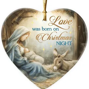 Heart-shaped Christmas ornament detail, Nativity scene illustration, holiday hanging decor.