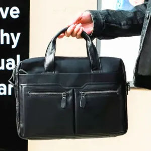 Black leather business briefcase for men, stylish casual messenger bag with double zip pockets.