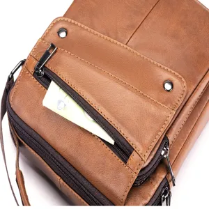 Premium brown leather men's shoulder bag detail view, multi-pocket design, stylish.