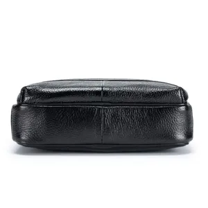 Men's leather messenger bag detail view, genuine cowhide business casual daily use bag.