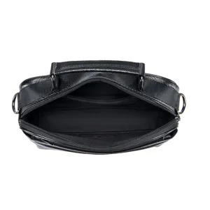 Detailed view of the black leather business bag interior, showing storage compartments.