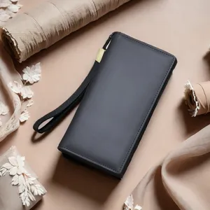 Black long leather wallet detail shot, men designer clutch purse with wrist strap and card slots.