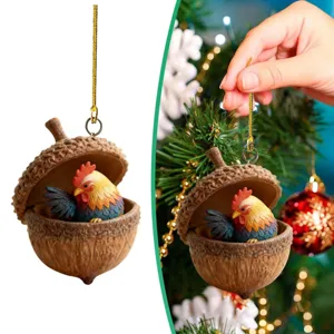 Cute Christmas tree hanging ornament featuring a colorful rooster inside a rustic acorn shell.
