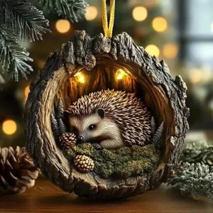 Christmas tree hanging ornament featuring cute hedgehog in tree hollow with pinecones and lights.