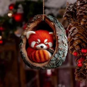Christmas tree hanging ornament featuring a cute sleeping red panda inside a festive hollow tree design.