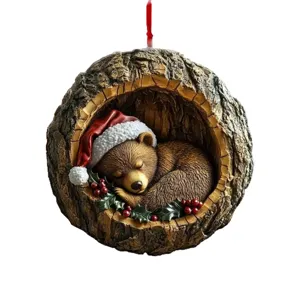 Christmas tree hanging ornament sleeping bear in tree trunk with Santa hat holiday decor