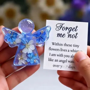 Handmade resin flower angel keepsake with dried forget-me-not flowers and meaningful message card.