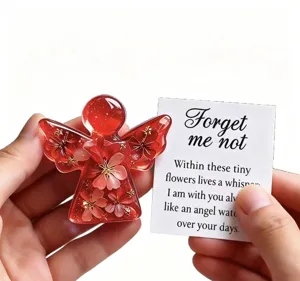 Red resin angel keepsake ornament with dried flowers and card for memorial and home decor gifts.