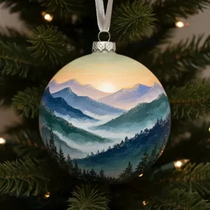 Hand-painted mountain scenery Christmas ornament detail, glowing pine tree background, festive decor.