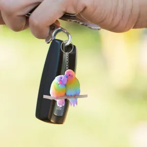 Colorful couple lovebirds keychain pendant, cute resin bird bag charm and car key accessory.