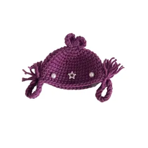 Handmade purple crochet hat with star pearl decor and cute side tassels for kids or dolls.