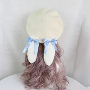Sweet Lolita wool beret featuring plush lop bunny ears and elegant blue bow knots.