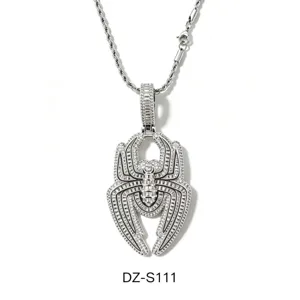Detailed view of hip-hop iced out spider pendant necklace with cubic zirconia and rope chain.