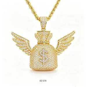 Close-up detail of iced out money bag pendant with wings and sparkling cubic zirconia stones.