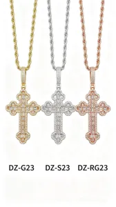 Rhinestone encrusted cross pendant necklace detail, multi-color metal chain showcase.