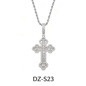 Detailed view of iced out cross pendant necklace with sparkling rhinestones on rope chain.