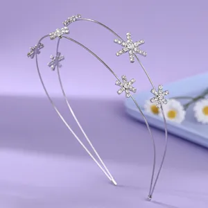 Double band crystal snowflake headband, elegant silver hair accessory for women parties.