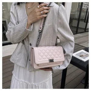 Pink quilted crossbody bag with metal chain strap, elegant shoulder bag for women daily use.