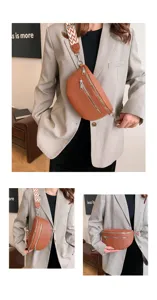 Vue détaillée du sac de poitrine marron pour femme en cuir avec large bandoulière à motifs et zips.