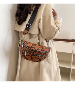 Retro snake print crossbody bag for women, fashion casual shoulder fanny pack with wide strap.
