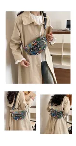 Detailed shot of trendy colorful snakeskin crossbody chest bag worn by female model.