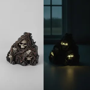Halloween solar skull lamp resin ornament with glowing LED eyes for spooky party decor.