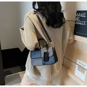 Vintage colorblock shoulder bag for women, stylish crossbody handbag with chic contrast design.