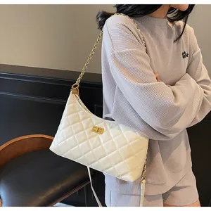 White quilted chain shoulder bag for women, stylish underarm dumpling bag for spring 2025.