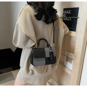 Color-blocked retro women crossbody bag, stylish top-handle handbag for daily commute.