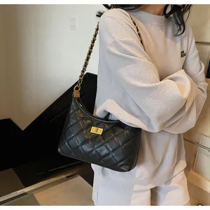 Stylish black quilted shoulder bag for women with chic chain strap and classic metal lock design.