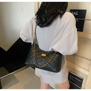 Women black quilted leather shoulder bag with gold chain strap, stylish chic dumpling handbag.