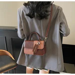 Color-blocked retro small square bag detail shot, stylish crossbody bag for women.