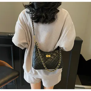Black quilted chain shoulder bag for women, trendy hobo dumpling crossbody bag design.