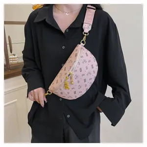 Pink chest bag detail, stylish crossbody waist bag with cute bear print and gold chain hardware.