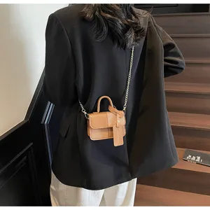 Chic contrast color retro mini handbag for women, stylish top-handle bag with chain.
