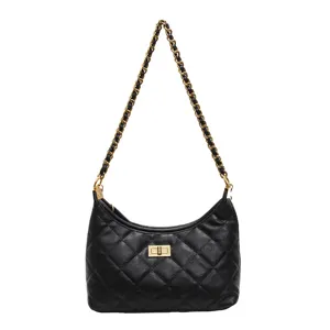 Black quilted shoulder bag with gold chain strap, stylish underarm dumpling bag for women.