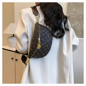 Stylish brown monogram chest bag for women, retro print crossbody fanny pack with wide strap.