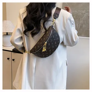 Stylish brown monogram chest bag for women, retro crossbody waist bag with bear charm.
