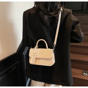 Color-block retro small handbag for women, stylish crossbody bag with handle and strap.