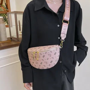 Trendy pink chest bag for women, stylish crossbody waist pack with wide fashion strap.
