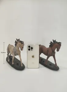 Resin horse figurine detail showing water transfer print texture and size reference item.