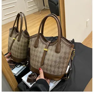 Retro fashion bucket bag with classic monogram pattern, large capacity shoulder crossbody bag.