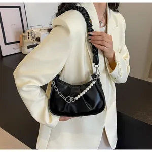 Stylish black ruched shoulder bag with pearl chain strap, elegant chic underarm purse for women.