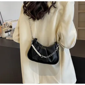 Stylish black faux leather shoulder bag with chic pearl and chain strap, ideal daily wear.