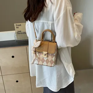Stylish women's crossbody shoulder bag with argyle pattern and top handle for daily wear.