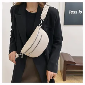 Sac à bandoulière élégant pour femme avec sangle large, sac banane en cuir synthétique.