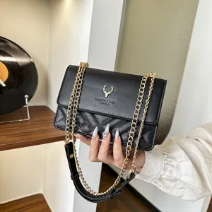 Classic black quilted shoulder bag with gold chain strap, elegant and stylish design.