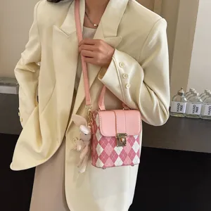 Pink plaid small crossbody bag with rabbit pendant, trendy PU leather phone bag for women.